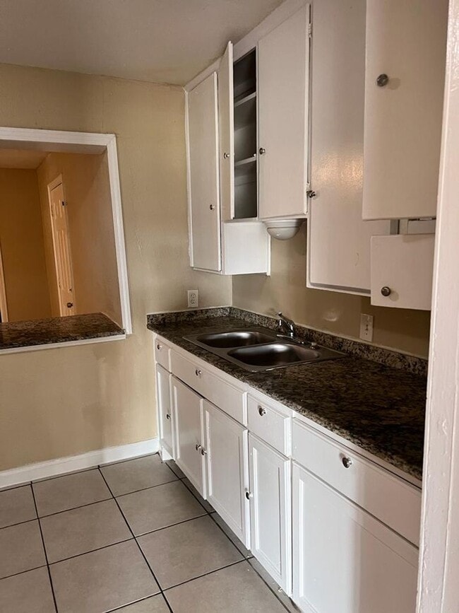 Photo - Completely Renovated, huge back yard and close to everything!