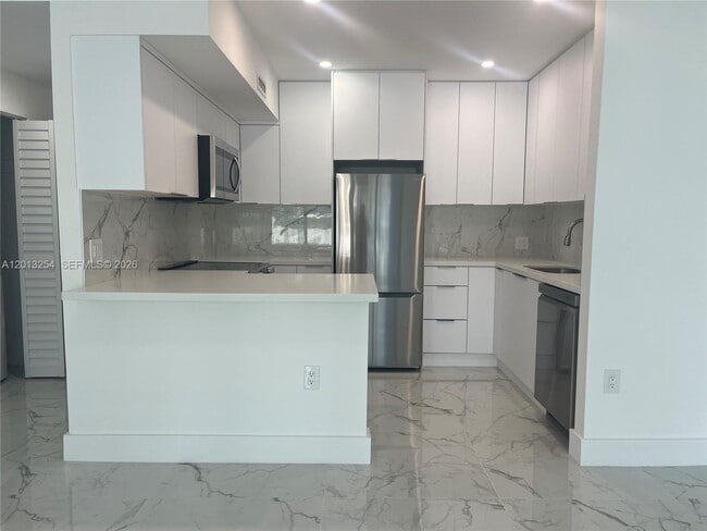 Building Photo - 3505 S Ocean Dr Unit 210