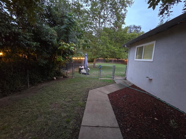 Photo - 3 bed 1 bath Duplex with garage and private yard