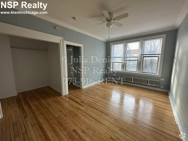 Building Photo - 1369 W Estes Ave Unit 1I Rental