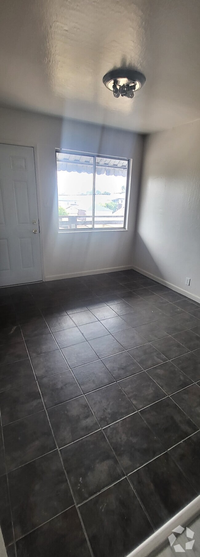Building Photo - 2509 109th Ave Unit C Rental