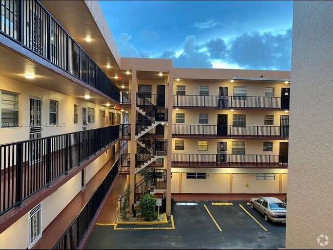 Building Photo - 1855 W 60th St Unit 210-C Rental