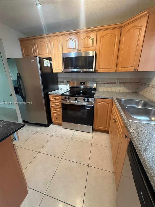 Building Photo - 5080 SW 64th Ave Unit 104