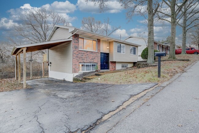 Photo - Updated, pet friendly 4 bedroom 1.5 bath in the Fox C-6 school district. Unit 2320