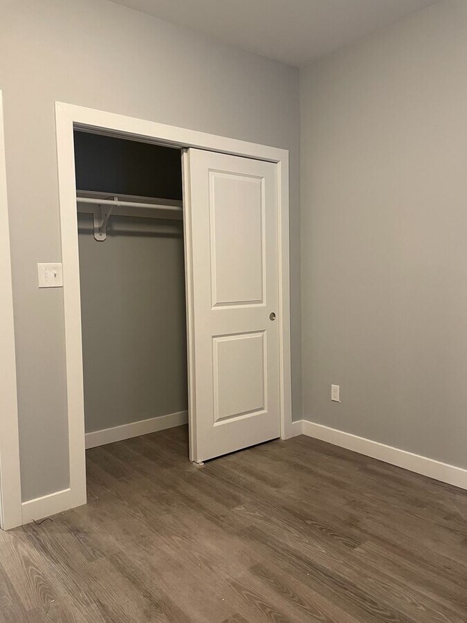 Photo - Bright & Spacious 3-Bedroom Apartment with In-Unit Washer/Dryer | Heat & Hot Water Included | Nea... Unit 1