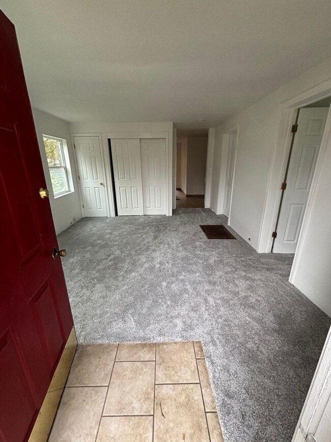 Photo - Half off first month's rent! Cute 2-bdrm/1-bath St. Johns duplex. Garage, new paint/carpet/fridge Unit 9848 N Willamette