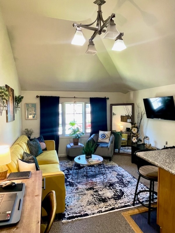 Living room opens to kitchen - 128 College Ave Unit Cozy One Bedroom