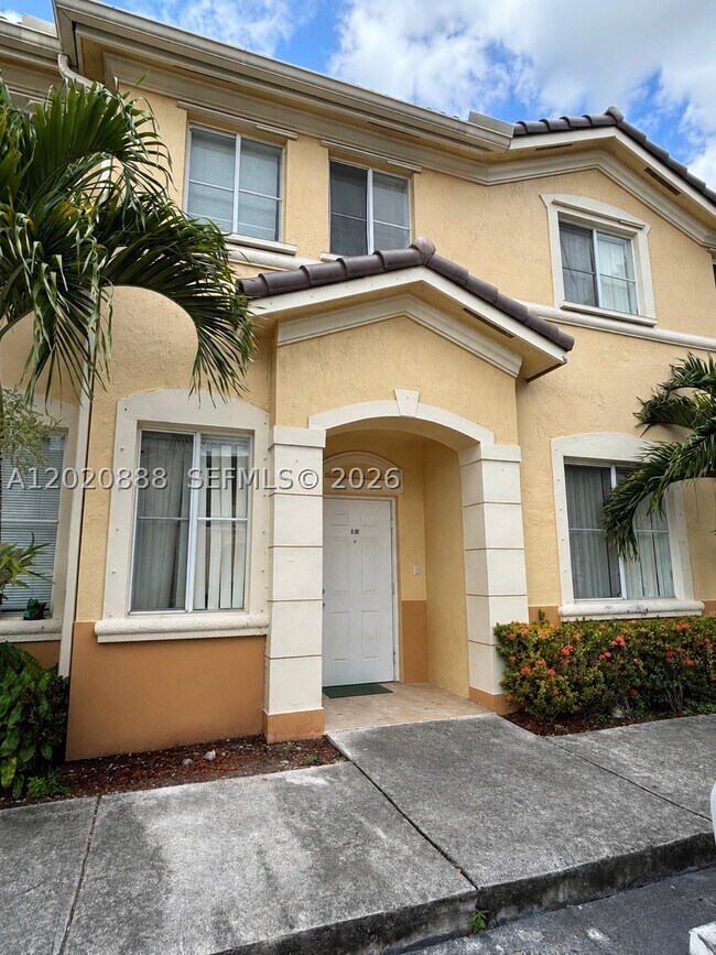 Building Photo - 6920 NW 177th St Unit Q101