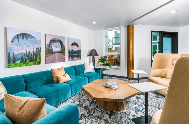 Relax and unwind in style at Modera Northgate, where the lounge offers a comfortable, inviting space to connect with friends or enjoy a quiet moment in your new home.