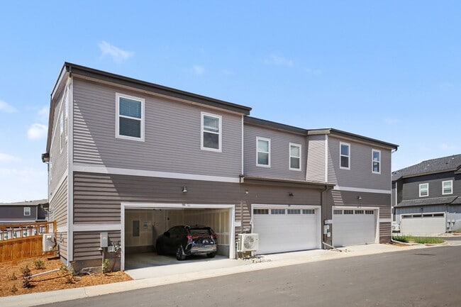8' tall, direct-access two-car garages - The Lanterns at Brighton Crossing