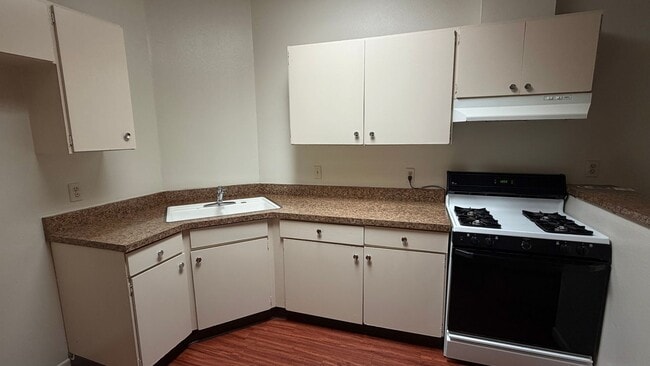 Photo - ? Just listed and won’t last long! 2 bed, 1.5 bath condo with private patio yard & in-unit washer... Unit A