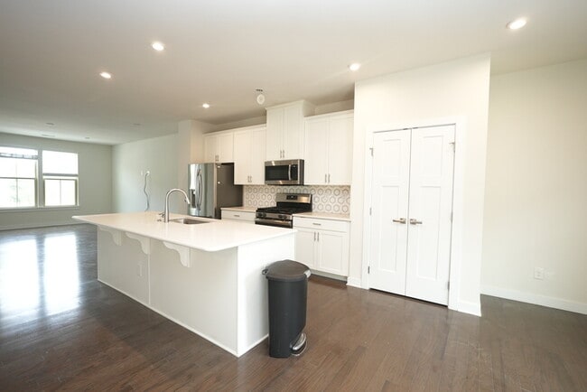 Photo - Three story town home with 2 car garage