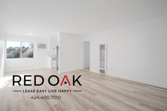 Building Photo - 8555 Independence Ave Unit 201