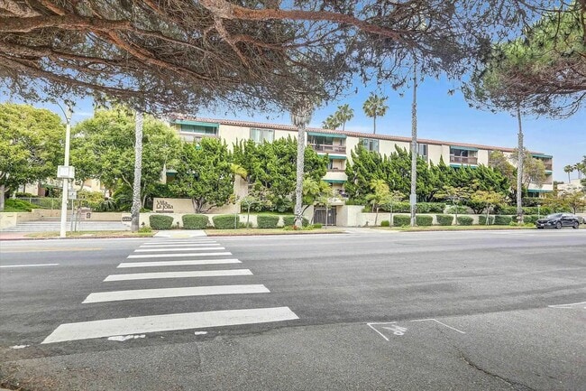 Photo - JUST BLOCKS TO THE BEAUTIFUL WIND AND SEA BEACHES!