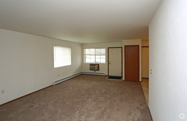 End unit Living room with carpet
