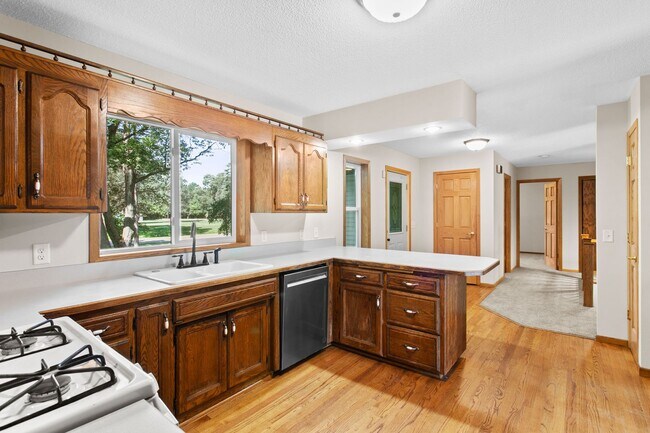 Photo - Rent in Andover 4 bd 3 ba 5 garage stalls, 1 AC avail NOW: $2,895/mo plus utilities.