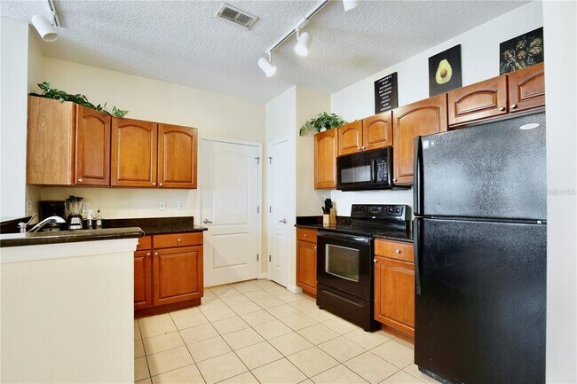 Photo - 5255 Cane Island Loop Unit 204