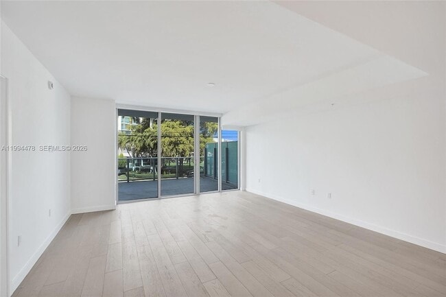 Building Photo - 9221 E Bay Harbor Dr Unit 210