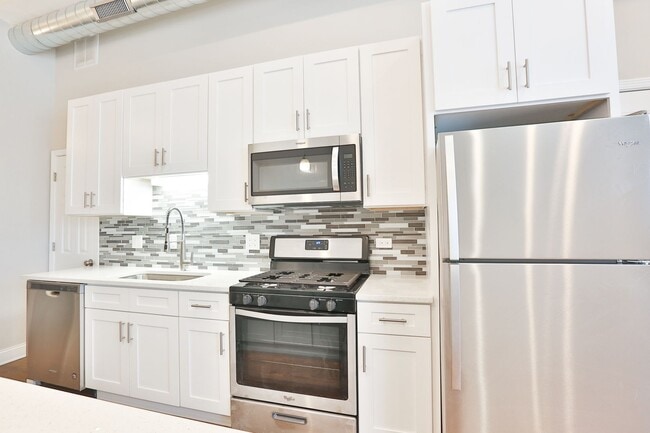 Photo - Gorgeous 2Bed/1bath in Logan Square! Condo Quality! In-Unit Laundry! Central Air! Stainless Steel! Unit 1F