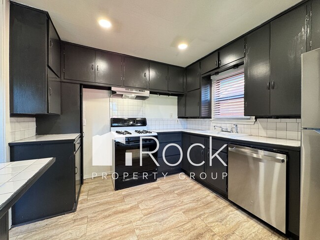 Building Photo - Charming Home with Real Wood Floors and Covered Parking ~ Offering 1 Month FREE Rent~