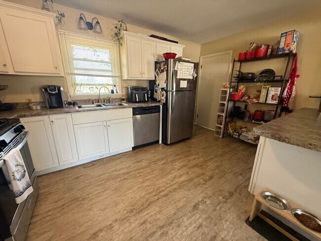 Photo - Centrally Located 3 Bed Gem with Expansive Backyard & Classic Hardwood Floors