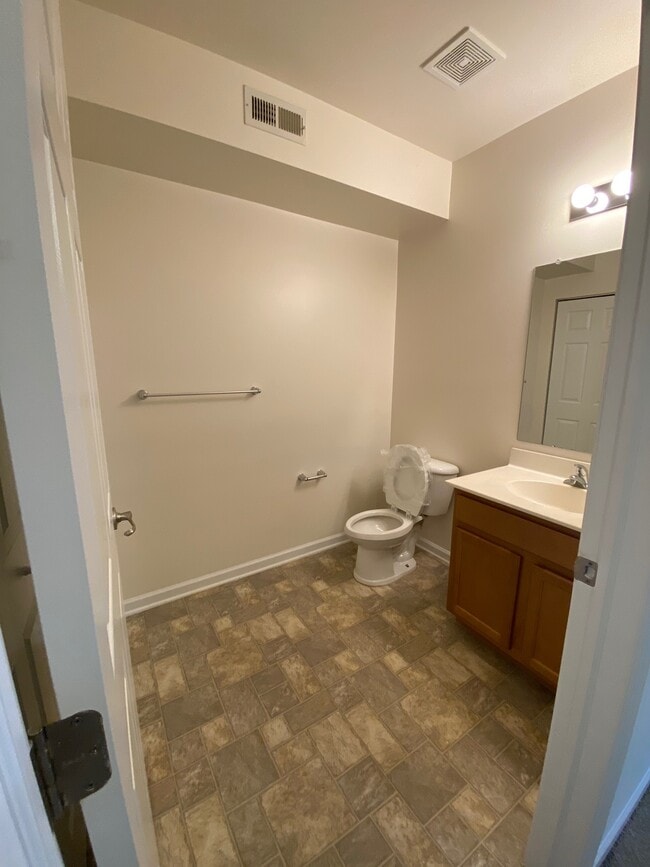 1 bedroom half bath located in hallway - Christina Apartments