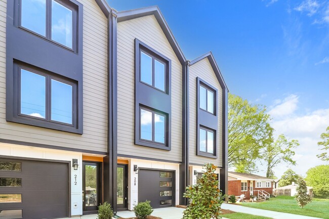 Photo - Beautiful 3BR 2.5BA Townhome w/ Full Appliance Kitchen • Garage Parking • Ultra-Modern