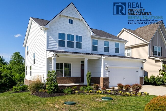 Photo - Great 4 bd 2.5 ba with attached garage and large deck!