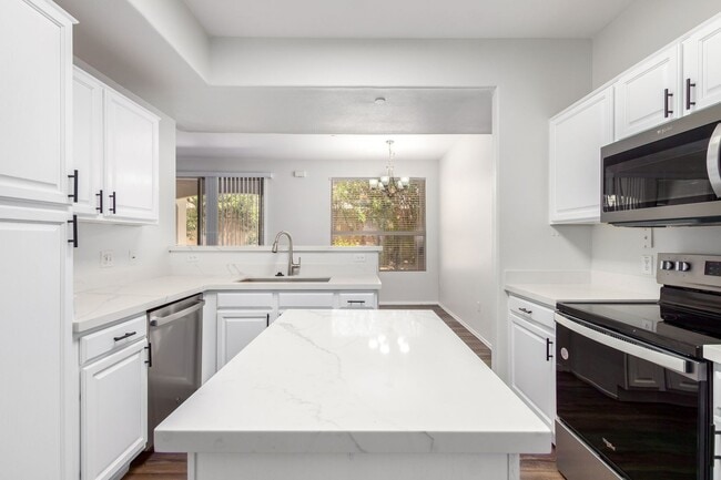 Building Photo - North Scottsdale Large 3 bed condo with attached 2 car garage, 1st floor Unit 9550 E. Thunderbird # 130 -- WELLINGS