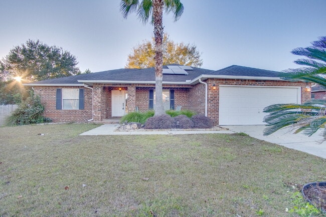 Photo - Energy-Efficient 3BR/2BA Solar Home in Pace with Screened Porch, Fenced Backyard, Updated Kitchen...