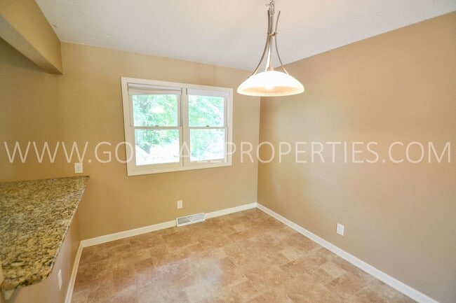 Photo - Charming 3-Bedroom Home in West Des Moines with a 2-Car garage and a fenced yard