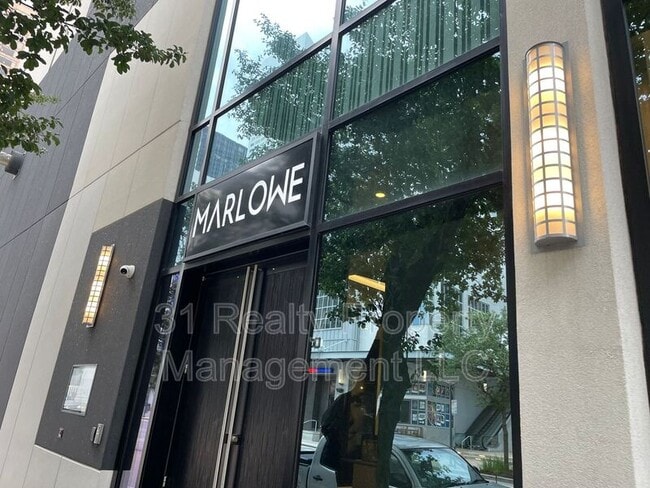 Building Photo - 1211 Caroline St Unit #1108