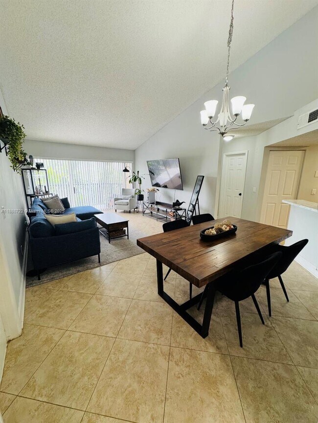 Photo - 8821 Wiles Rd Unit 305