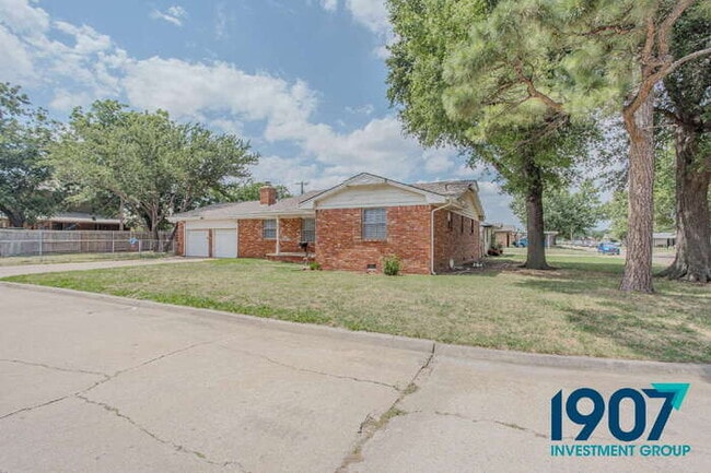 Photo - Spacious 2-Bedroom Home with Hardwood Flooring and Brick Fireplace in OKC!