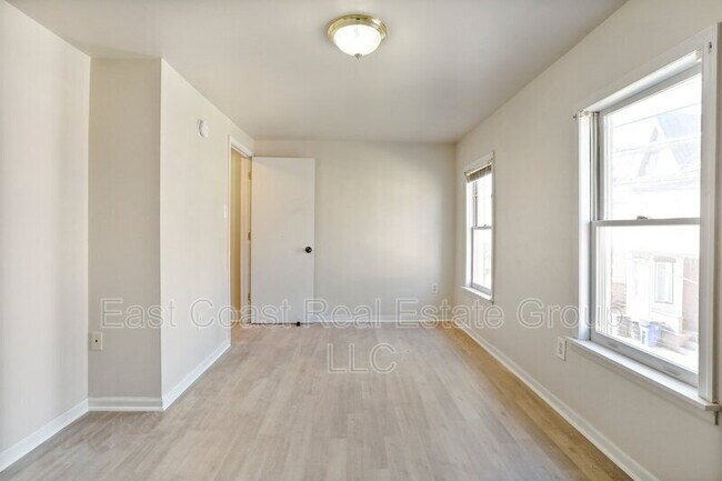 Photo - 2 Bedroom, 1 Bath, Central Air Conditioning, Washer Dryer in unit.