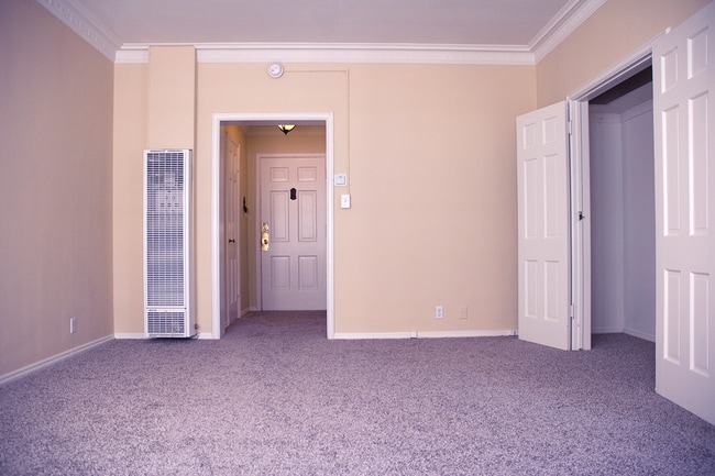 Main room looking at front door - 539 S Berendo St Apartments Unit 11