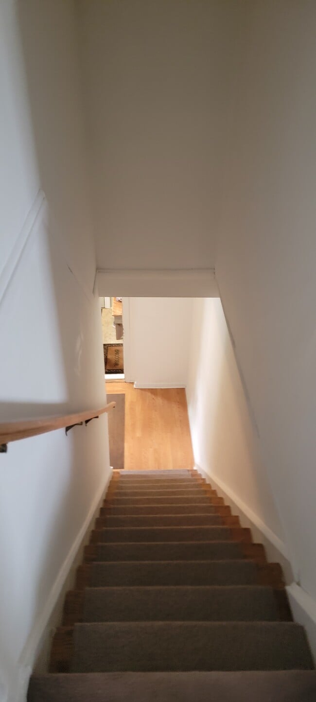 Looking down into entry - 20 E Spring St Unit Upstairs