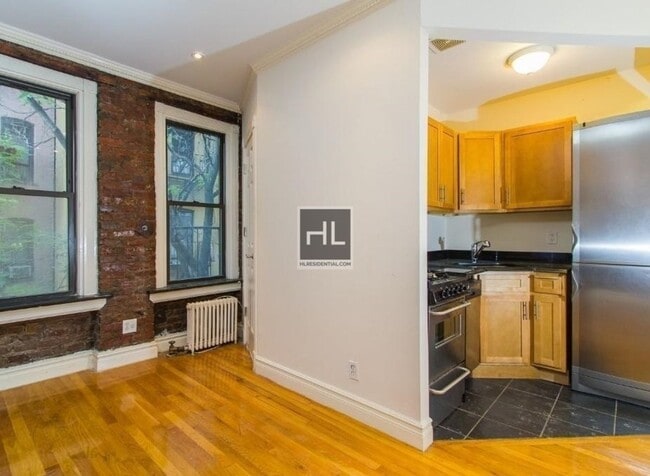 Building Photo - E 13TH ST. Unit 3E