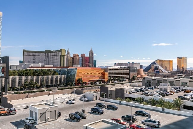 Building Photo - Iconic Strip-View Luxury | Elegant 1BR + Den High-Rise Residence