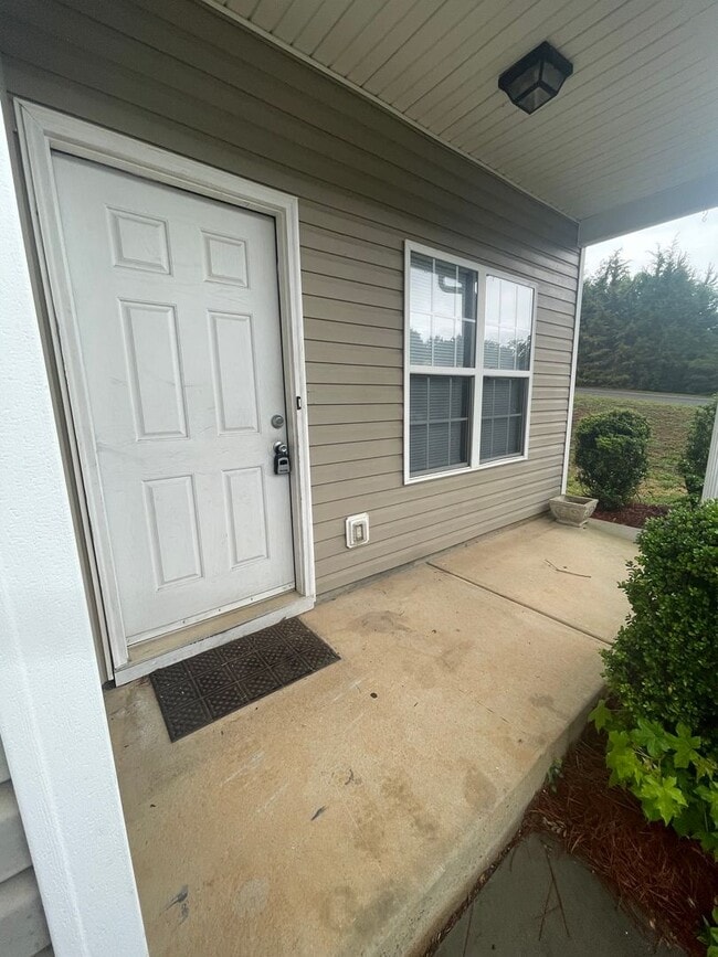 Photo - This two-story, 4-bedroom, 2-bath duplex in Fort Mill, SC sits on a corner lot