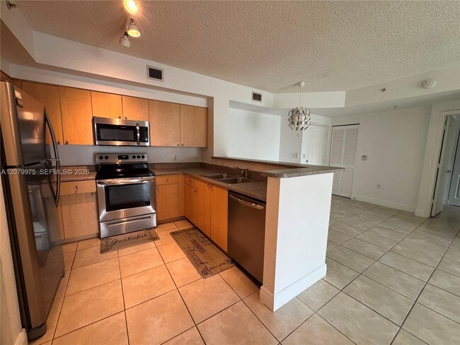 7920 N Nob Hill Rd Unit 103