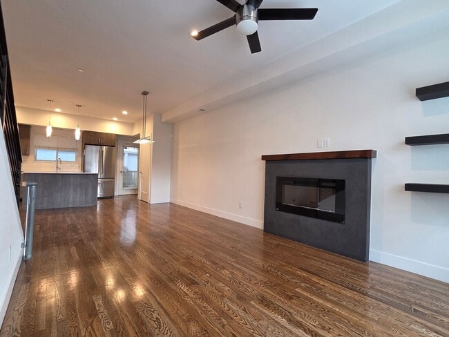 Photo - STUNNING 4-LEVEL TOWNHOME IN HIGHLANDS WITH SAUNA, 2-CAR GARAGE + AMAZING ROOFTOP DECK!