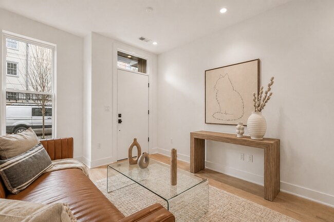 Photo - Garage parking, private outdoor space, and skyline views—this Northern Liberties home checks ever...