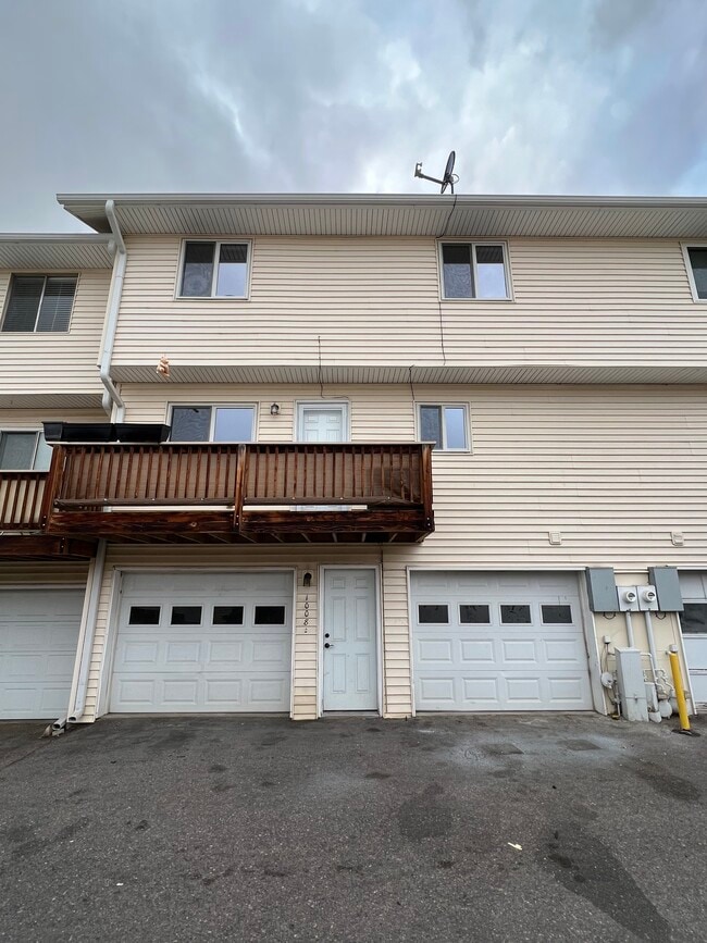 Back (porch and garages) - 1008 S Miller St