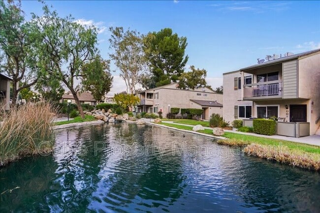 Building Photo - 24526 W Nicklaus Dr Unit #P1
