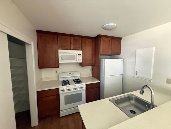Photo - 2 bed | 1 bath | 795 SF | Shared garage | Downstairs unit | WS&G Paid by Owner