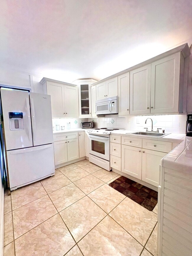 Photo - 20500 W Country Club Dr Unidad Condo in Biscaya - Aventura