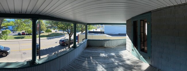 Photo - *NO PET DOGS* Upper 1 bedroom all Utilities included Unit 2 Bed - Front Building - Upper Left