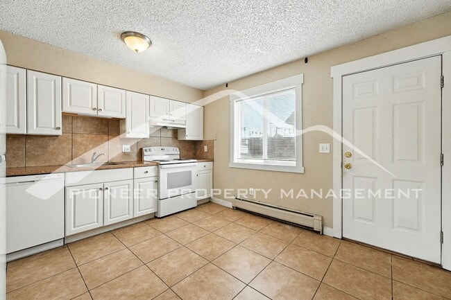 Photo - Charming Condo with Washer/Dryer and Reserved Parking