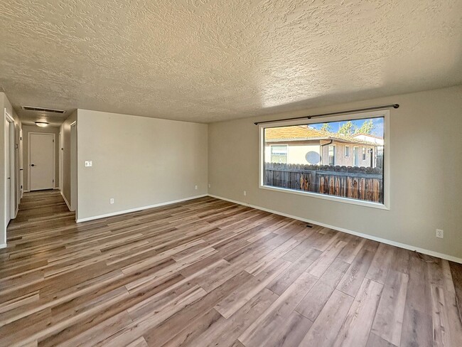 Building Photo - 3-Bedroom Boise Home with Outdoor Fireplace, Fenced Yard & LVP Flooring Near Downtown | $500 Off ...